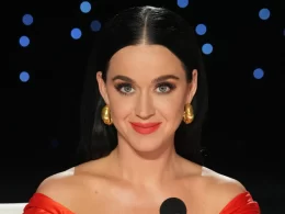 Katy Perry Gets Fiery Red in Corset, Feathers and Slit Skirt on ‘American Idol’